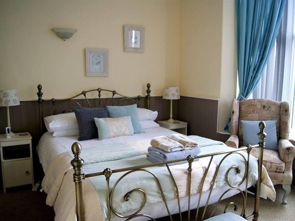 Sunset Guest House Ханстантон Экстерьер фото A bedroom at the hotel