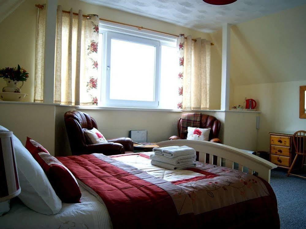 Sunset Guest House Ханстантон Экстерьер фото A typical bedroom